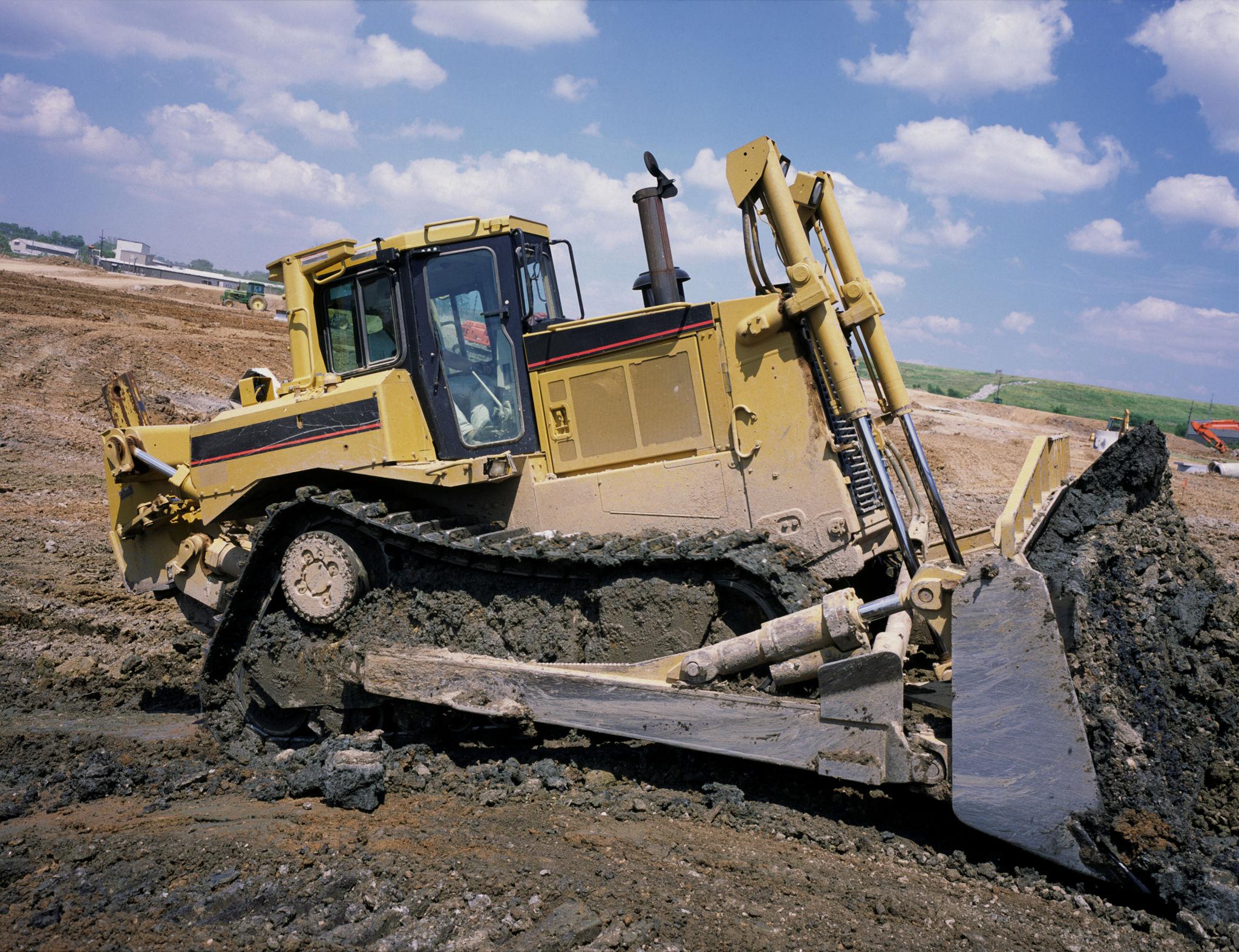 Bulldozer pushing soil